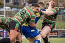 Elliott Cousins (13) scored one of West Bowling's two tries in their heavy defeat at Hunslet ARLFC.