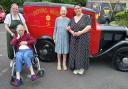 Residents and staff photographed with the van
