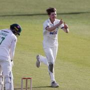 George Hill (right) celebrates taking the wicket of Leicestershire batsman Louis Kimber last Friday in Yorkshire's opening County Championship match of the season.