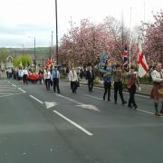The parade makes its way along North Street