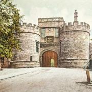 Skipton Castle's gateway depicted on a postcard