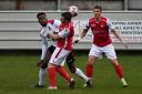 Thackley's James Rothel and Laurence Sorhaindo, left, challenge for the ball. Picture: Richard Leach