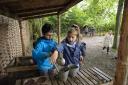 Children playing in the mud pie kitchen at East Riddlesden Hall, West Yorkshire. Picture by National Trust Images/Trevor Ray Hart