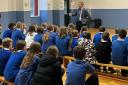 MP Robbie Moore talks to pupils at Haworth Primary School