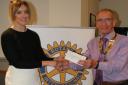 John Exley presents a cheque to Alex Green of Yorkshire Cancer Research                     Picture by Bryan Ayton