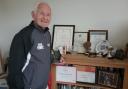 Hans with some of his awards, the British Empire Medal award taking pride of place