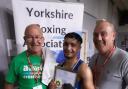 Jamaal Rehman (centre) celebrates his Yorkshire title with his coaches John Daly and Mark Ingham. Pic: Yorkshire Boxing.