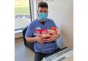 Muhammed Idrees, Senior Pharmacy Technician at Airedale NHS Foundation Trust with some of the soft dolls that have previously been donated