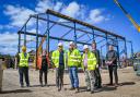 Pictured at the site are, from left, Justin Robinson of Hayfield Robinson; Michelle Rushworth, Bradford Council’s Keighley regeneration manager; Bernard, Andy and Peter Rock, of Rock Structural PMC; Cllr Alex Ross-Shaw and Ian Hayfield