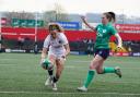 Ellie Kildunne scores for England in their Women's Six Nations win over Ireland last April.
