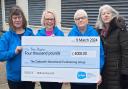 Group members with the latest cheque for Manorlands