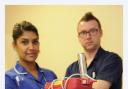 Senior charge nurse Richard Rees-Jones with staff nurse Qusva Ilyas and one of the outdated cardiac monitors the appeal will help replace