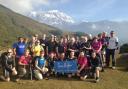 The Manorlands trekkers in front of Lamjung Himal mountain