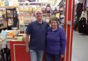 Eric and Necia Croden next to their sweet shop which is now up for sale