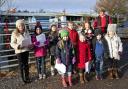 Lees schoolchildren sing carols at Denholme garden centre during Christmas celebrations
