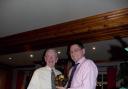 Nigel Costello receives the Keith Simpson Shield from Brontë Wheelers president Joe O'Doherty