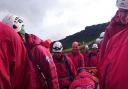 Search and rescue volunteers during their rescue of an injured woman at Earl Crag above Cowling