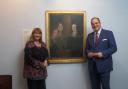 Arts Minister Michael Ellis with Brontë Parsonage Museum executive director Kitty Wright as they examine the Pillar Portrait. Picture by Simon Warner