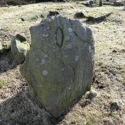Lozenge incised into a standing stone marking the boundary on the slopes of Great Snowden.