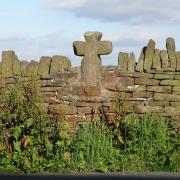 The cross head in the wall at Stanbury.