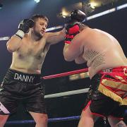 Danny Whitaker, left, suffered his third defeat in seven professional bouts. Picture: DKO