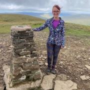 Catherine Jowitt at the top of Pen-y-ghent during a training walk