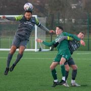 Steeton (green) fought hard, but it was Nelson who came out on top in a tough battle in the end. Picture: John Chapman.