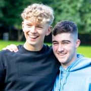 Steeton, Yorkshire and England talent Will Luxton (left) with racing driver Lorcan Hanafin at Bradford Grammar School in August after their A-Level results.