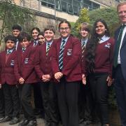 Holy Family School students with MP Robbie Moore