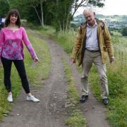 Councillors Caroline Whitaker and Andy Brown on the section of towpath