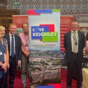 MP Robbie Moore, fifth from left, with representatives of the businesses at the event