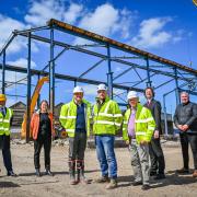 Pictured at the site are, from left, Justin Robinson of Hayfield Robinson; Michelle Rushworth, Bradford Council’s Keighley regeneration manager; Bernard, Andy and Peter Rock, of Rock Structural PMC; Cllr Alex Ross-Shaw and Ian Hayfield
