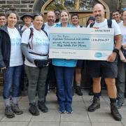 The Big Walk for Mum team hands over a cheque to Manorlands