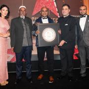 The Barlick Raj Balti team receives the award