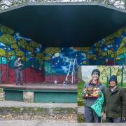 Artist Emma Denby at work on the mural, and inset, pictured with Charlie Bhowmick