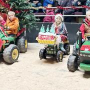 From left, mini tractor run winners William and Olivia Coates, runner-up Penny Walker and third-placed Arthur Bradley