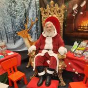 Santa in his grotto at Cliffe Castle Museum