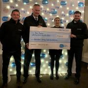 At the cheque handover are, from left, junior funeral director Paul Wilkinson, managing director David Gallagher, Manorlands’ Liv Moffat and junior funeral director Sam Gallagher