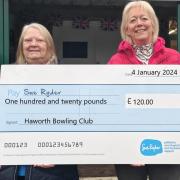 Gail Hind and Christine Harker of Haworth Bowling Club with the cheque for Manorlands