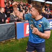 Sam Hallas celebrates with the Bulls supporters at full time on Sunday, on what was a great day out for the 3,729 fans in attendance.