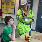A pupil with a representative of Balfour Beatty