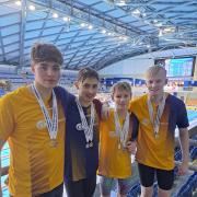 Freddy Dean, Dawid Naglik, Quinn-Austin Kelly and Will Skiggs (left to right) claimed a magnificent team gold medal for City of Bradford Swimming Club at the Yorkshire Championships.