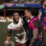 Oscar Thomas celebrates scoring in Keighley's 10-try romp against Cornwall yesterday.