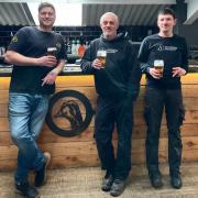 Toasting the new ale: from left, Joe Atkinson, of Goose Eye Brewery, and Adrian Chapman and Oliver Clayton-Green of Wishbone Brewery