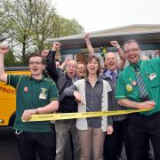 Meg Crossley opens the new Morrisons M Local store with store manager Nick Eglington, right, and his colleagues