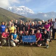 The Manorlands trekkers in front of Lamjung Himal mountain