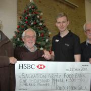 Representatives from Riddlesden Gala committee presenting proceeds from this year’s gala to Salvation Army lieutenant Ben Cotterill, second right