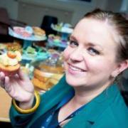 Jodie Hearnshaw, charity fundraiser at Airedale Hospital, with a few tempting treats
