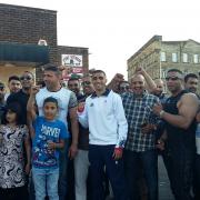 Muhammad Ali, centre, is joined by friends, family and supporters at his Olympic send-off in Bradford