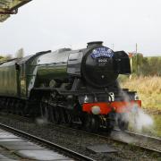 The Fllying Scotsman makes a stop in Hellifield Station on Tuesday. Picture by Philip Winstanley.